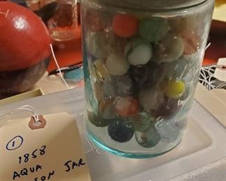 1858 aqua mason jar w zinc lid and 75 old marbles