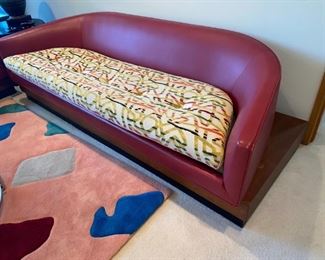 ADRIAN PEARSALL "CLOUD" SOFAS ON PEDESTALS, FINISHED IN FINE RED LEATHER AND CUSTOM WOOL TEXTURED UPHOLSTERY