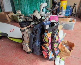 Three sets of ladies golf clubs