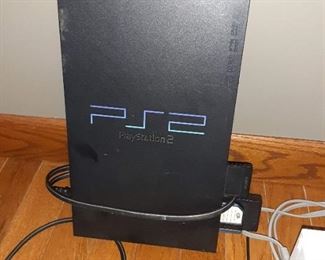 PlayStation 2 Gaming System  with games and controllers