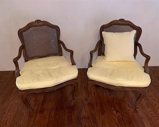 Pair of vintage caned armchairs
