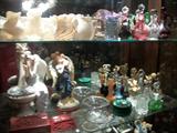 SHELVES FULL OF GLASSWARE