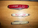 SEVERAL COCA COLA KNIVES