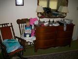 NICE DRESSER AND SEVERAL ROCKING CHAIRS.