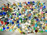 BOX FULL OF VINTAGE MARBLES. SOME SOLD SEPARATELY AND SOME WILL BE SOLD BY THE BAG FULL