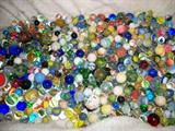 BOX FULL OF VINTAGE MARBLES. SOME SOLD SEPARATELY AND SOME WILL BE SOLD BY THE BAG FULL