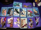 Boxes and boxes of the "Just the Right Shoe" items by Raine. Most boxes have two or more of the tiny shoes.