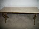 Marble top dressing bench at foot of king size bed