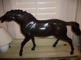 close up of large metal horse