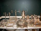 Mostly silver plated items including nice coffee samovar, deco candlelabra, trays, bowls, etc. small sterling pieces....family removed the sterling candlelabras from sale