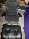 A closer view of Eames chair and ottoman (not a matched set)