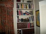 Den's book case...owner is withdrawing many of the books