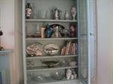 Another closer up pic of bookcase full of treasures