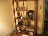 Interesting room divider full of nice oriental items including cloisonne, Indian brass, and misc
