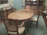 Beautiful light wood (Fruitwood?) Dining room table with 8 cane back chairs