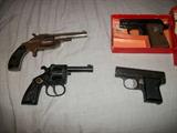 COLT JUNIOR .25CAL  IN BOX NO CLIP.
OAS    SMITHS NEW MODEL .32 NEEDS WORK
ROHM RG10 .22 CAL NEEDS WORK
BERNARDELLI - GARDONE V.T.-CAL 6.35 BREV   ITALY