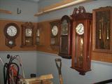 SEVERAL WALL CLOCKS.