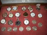 POCKET WATCHES AND SILVER DOLLARS.