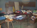 TABLES FULL OF LINEN, CLOTHES, BEDDING
