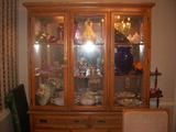 CHINA CABINET FULL OF GLASSWARE