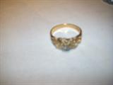10 KT YELLOW GOLD NUGGET RING WITH SMALL DIAMONDS.
