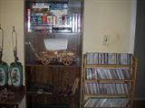 BOOKCASE, VHS, CDS, LAMPS,
VINTAGE KITCHEN ITEMS
