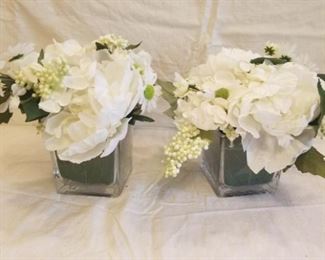 white silk flowers in square glass vases