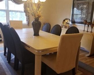 Dining room table and buffet.  Fiberglass mesh overlay.  Table with 2 leaves and 8 chairs.  