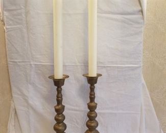 brass candlesticks and candles