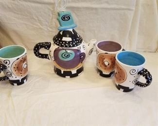 whimsical tea pot and mugs