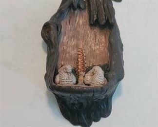 Funky wood carved owl's nest