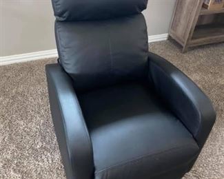 Black soft leather movie Recliner
Excellent condition! 
Measures: 3’ deep x 26 1/2” across 16” tall to seat, 31” tall to back.
Must be able to move and load yourself.
