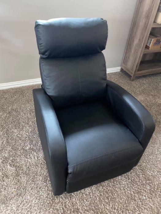 Black soft leather movie Recliner
Excellent condition! 
Measures: 3’ deep x 26 1/2” across 16” tall to seat, 31” tall to back.
Must be able to move and load yourself.