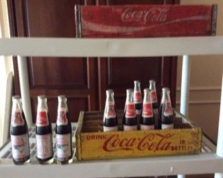 Coca cola bottles and cases