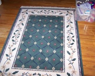 ONE OF THE AREA RUGS--THERE ARE SEVERAL SIZES THAT MATCH