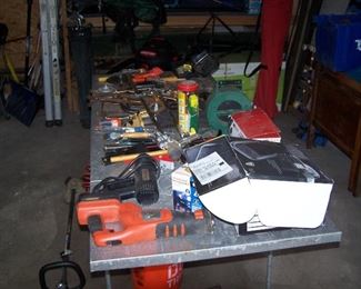 TABLE OF TOOLS IN THE GARAGE