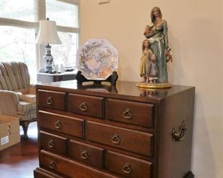 Silver chest with lined drawers and silver cloth dividers.