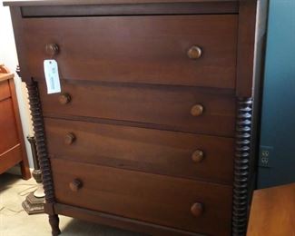 Chest of drawers with spool design