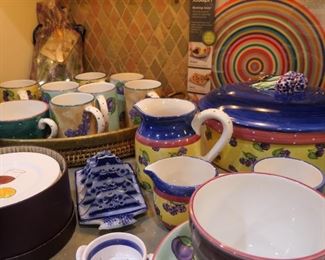 More colorful serve ware, mugs, canape plates, flow blue toast rack.