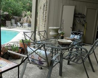 Sturdy patio set. Orange weathered cushions available.