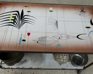Mid century tile top tea cart, signed Tye. Needs sand blasting, but tiles are intact.