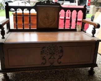 Hall bench with storage seat. Seat lifts. Bun feet, spindle back.