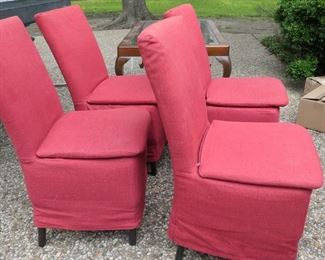 Set of four red dining chairs