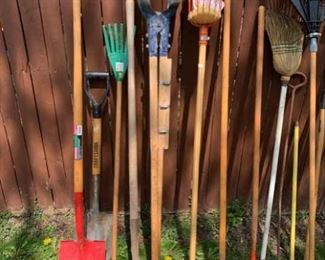 lawn tools, shovels, post hole digger, rakes, broom, fruit picker
