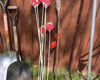 driveway markers, spud bar, shovels, roof rake