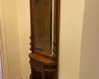 Antique hall tree wall unit with mirror, circa 1890...To Register and To Bid go to https://capitolsalesservices.hibid.com... 