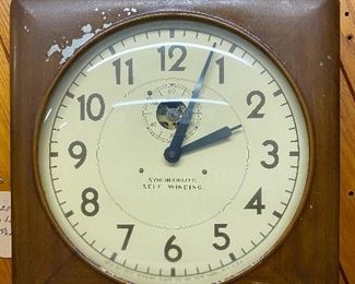 Western Electric Synchronized Clock...To Register and To Bid go to https://capitolsalesservices.hibid.com...
