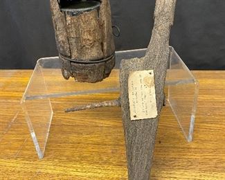 Civil War era telegraph Wade insulator  of a thread-less mounting bracket, a glass sleeve and a wooden cover used from the 1850s through the mid 1860s.
