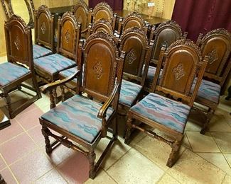 There are 12 dining chairs that consist of 2 arm chairs and 10 side chairs.  ...To Register and To Bid go to https://capitolsalesservices.hibid.com... 
