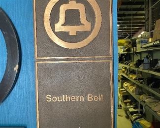 Southern Bell wall plaque sign ...To Register and To Bid go to https://capitolsalesservices.hibid.com...
